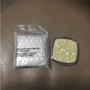 AVON compact wit faux mother of pearl accent set of 2 Both new never used